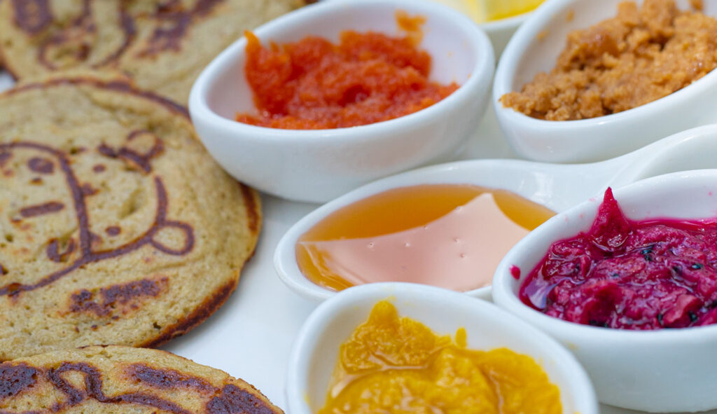 Sweet condiments with pikelets pancakes